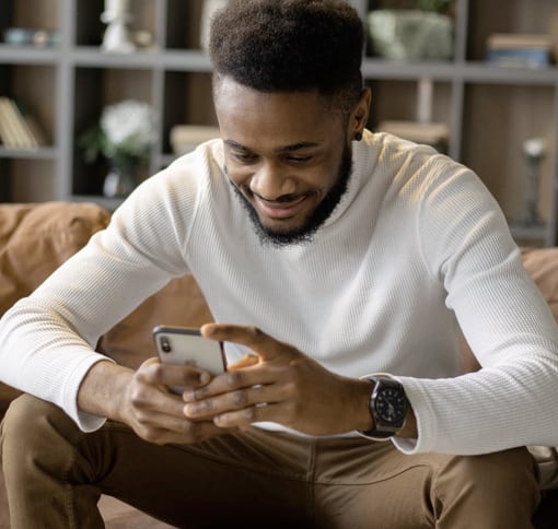 A man texting on his mobile device